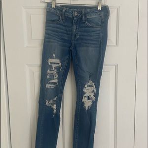 AMERCIAN EAGLE SIZE 4 next level stretch ripped jeans
